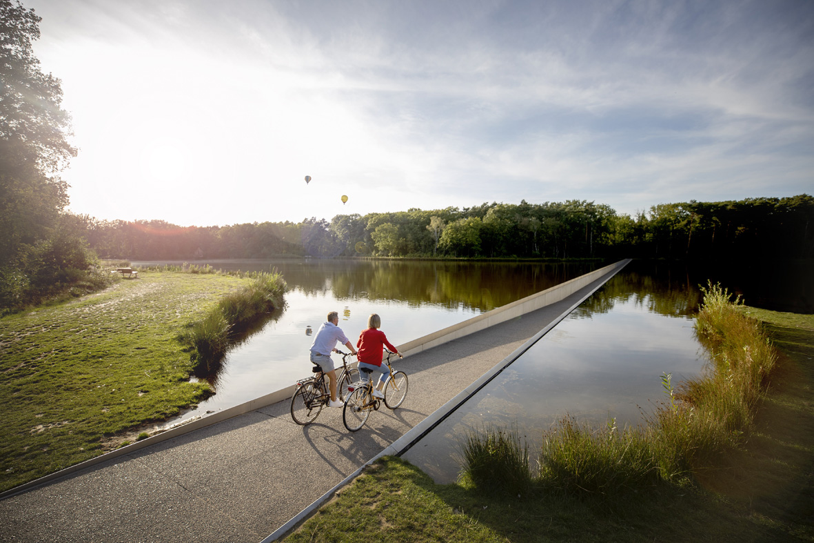 Fietsen door het water